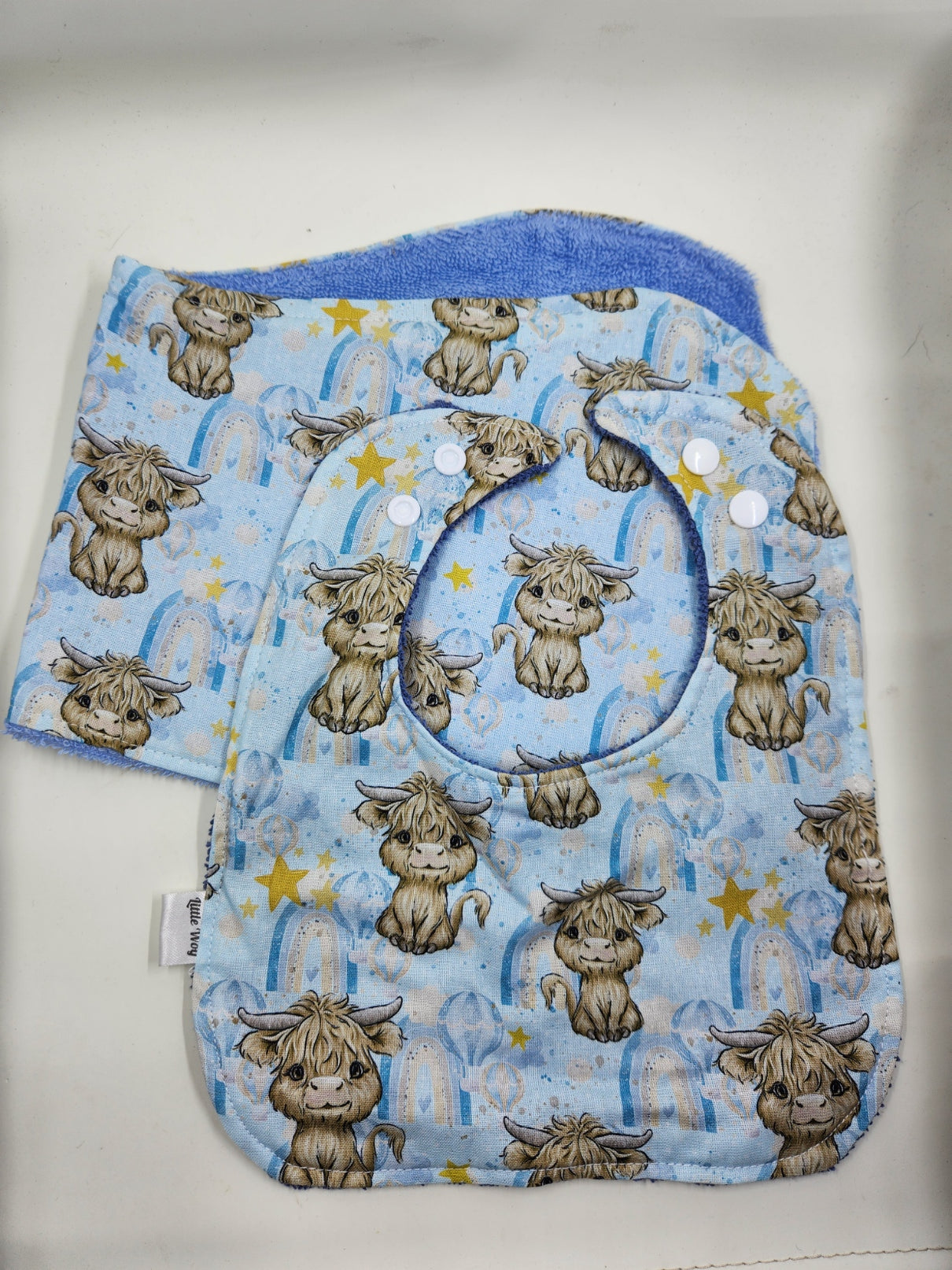 Light Blue Rainbow Highland Cow Bib + Burp Cloth Set