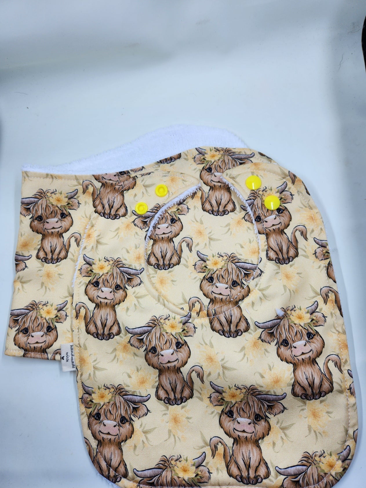 Light Orange Floral Highland Cow Bib + Burp Cloth Set
