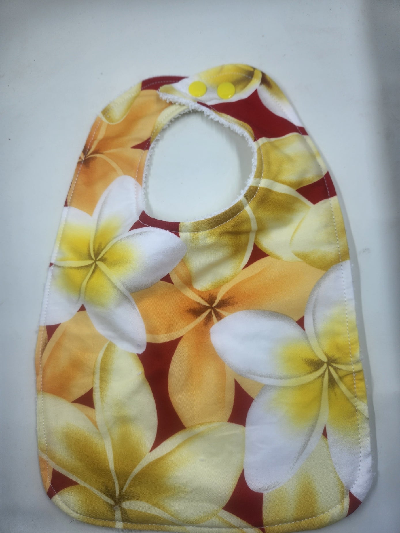 Frangipani Toddler Bib
