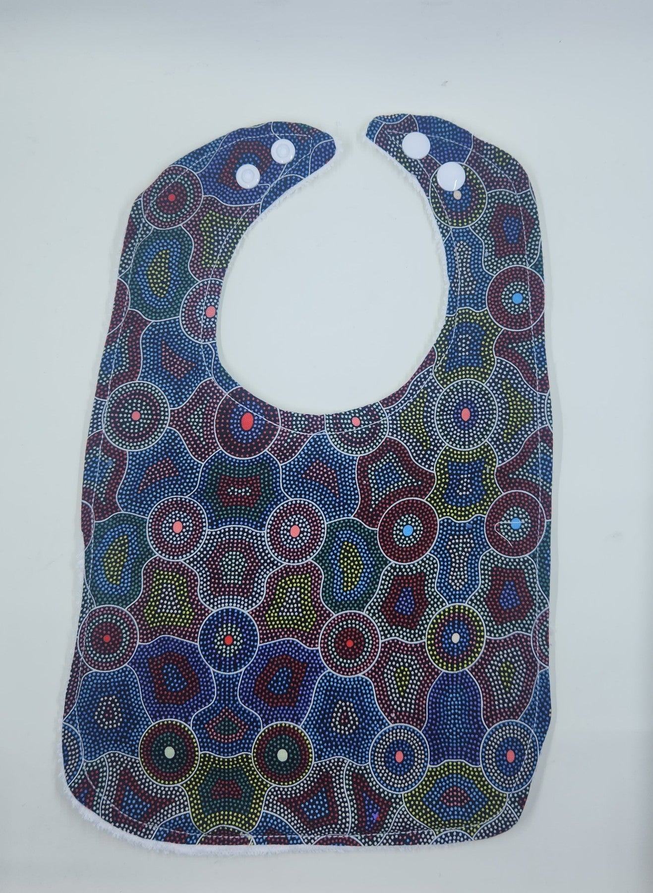 Yellow + Red + Blue Indigenous Circles Toddler Bib