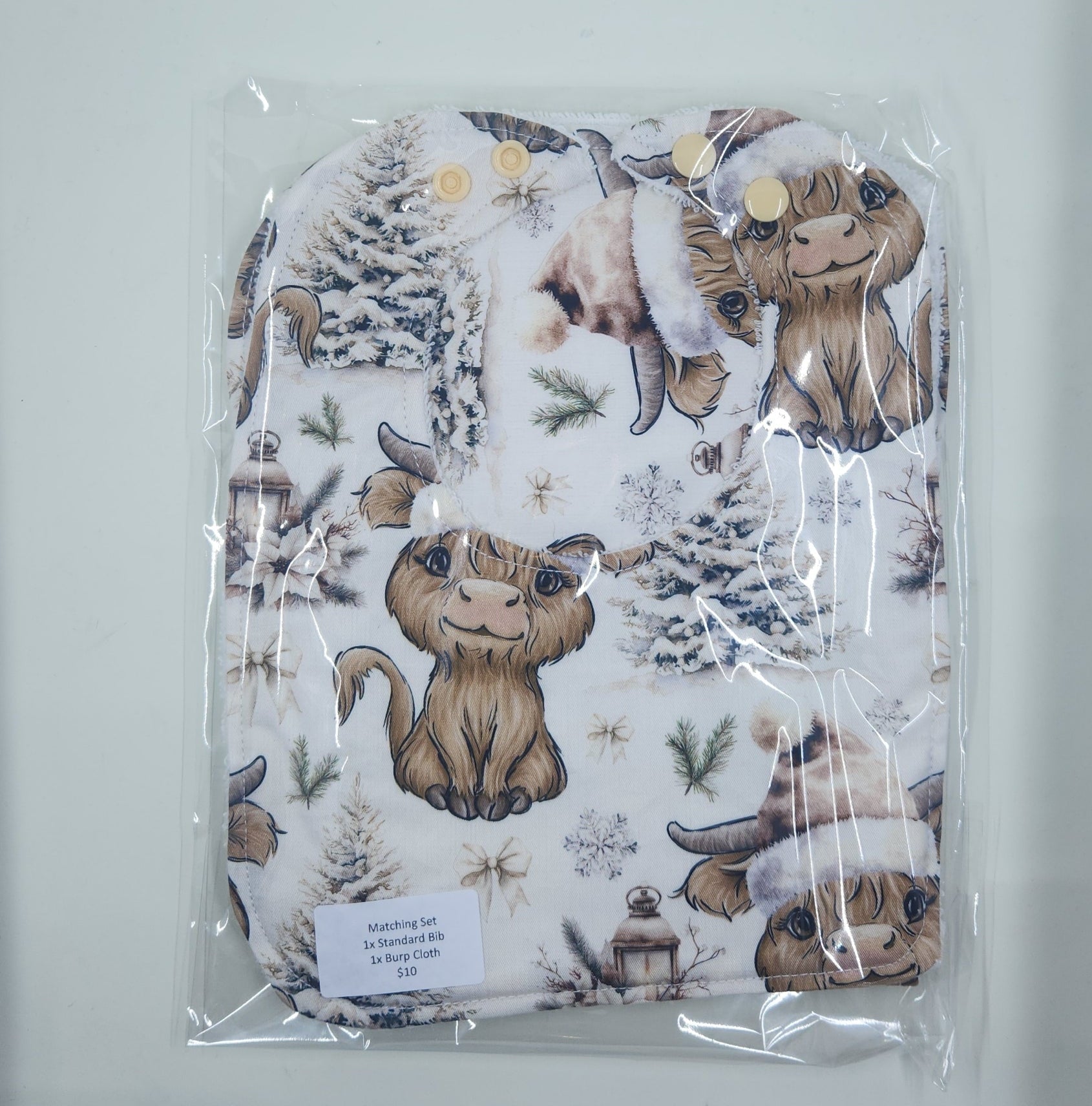 Christmas Highland Cow Winter Wonderland Bib + Burp Cloth Set
