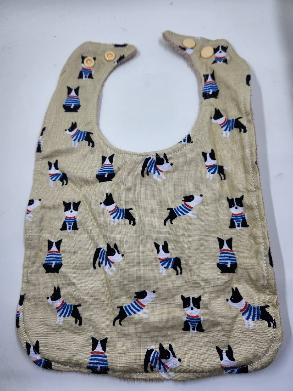 Beige Dogs Toddler Bib