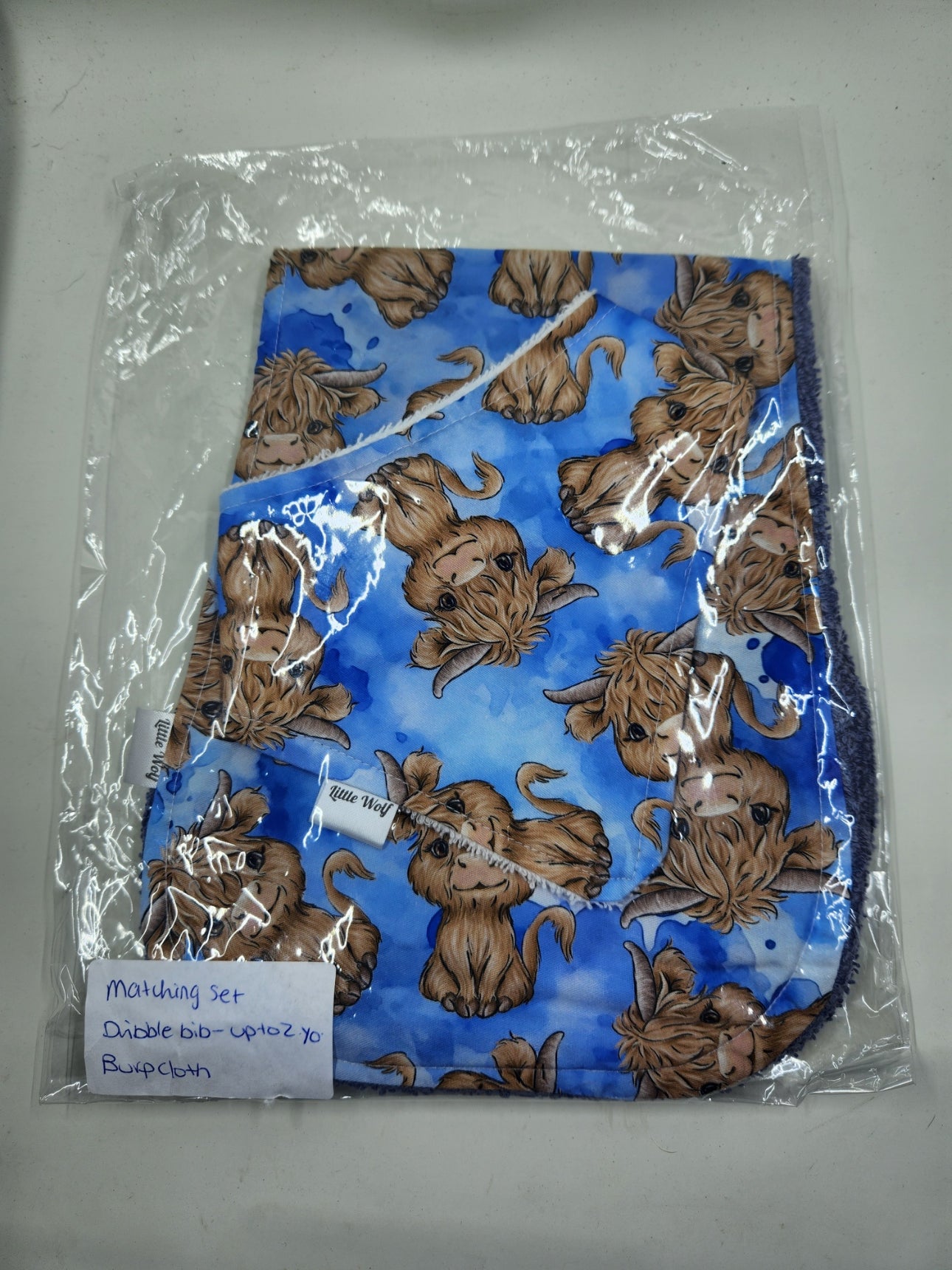 Blue Highland Cow Splatter Bib + Burp Cloth Set