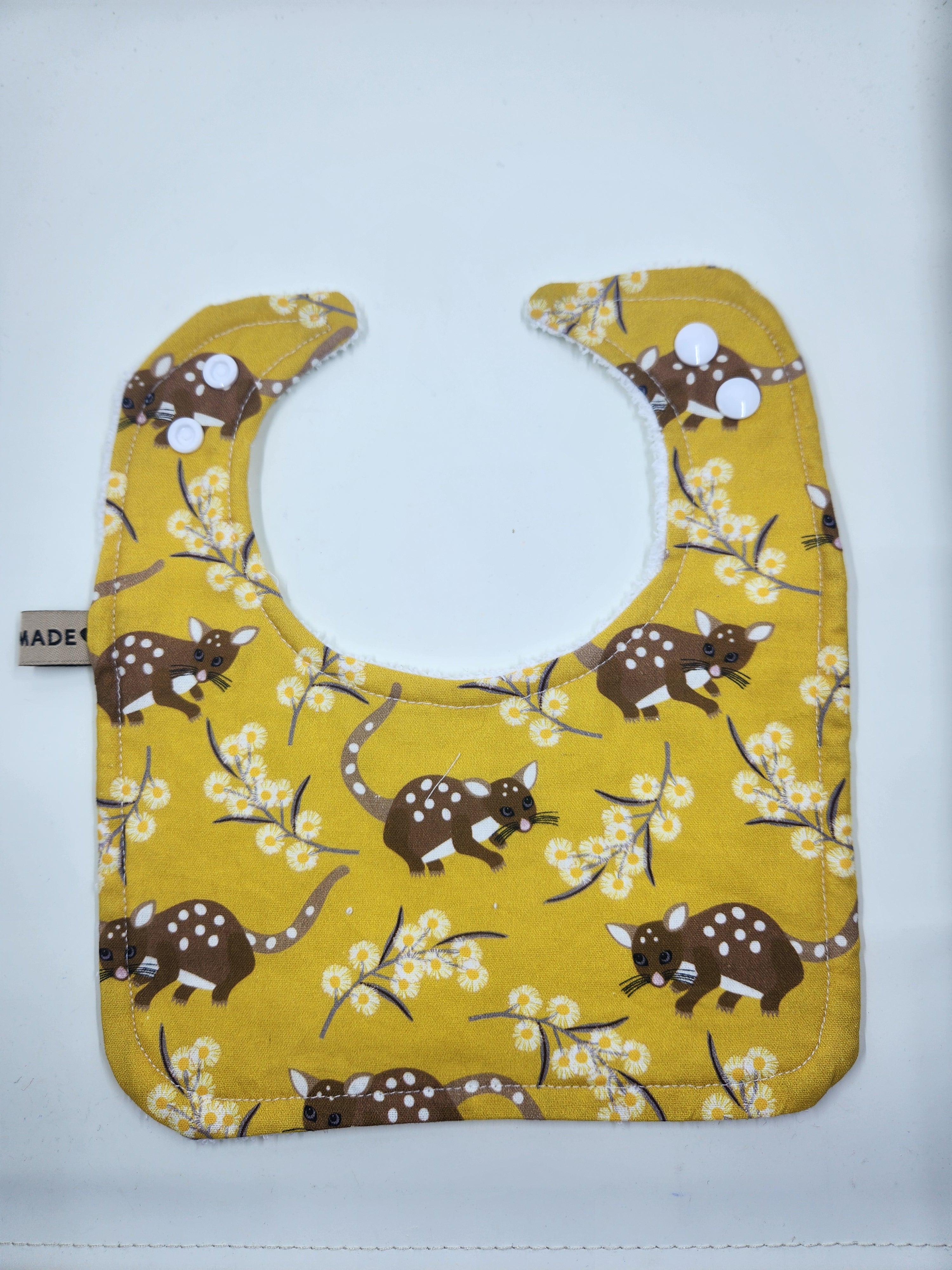 Mustard Quoll Bib